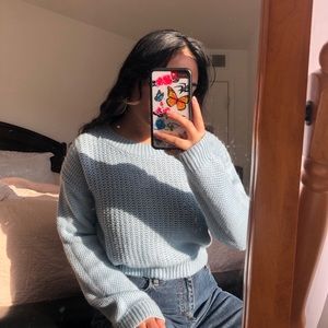 light blue sweater